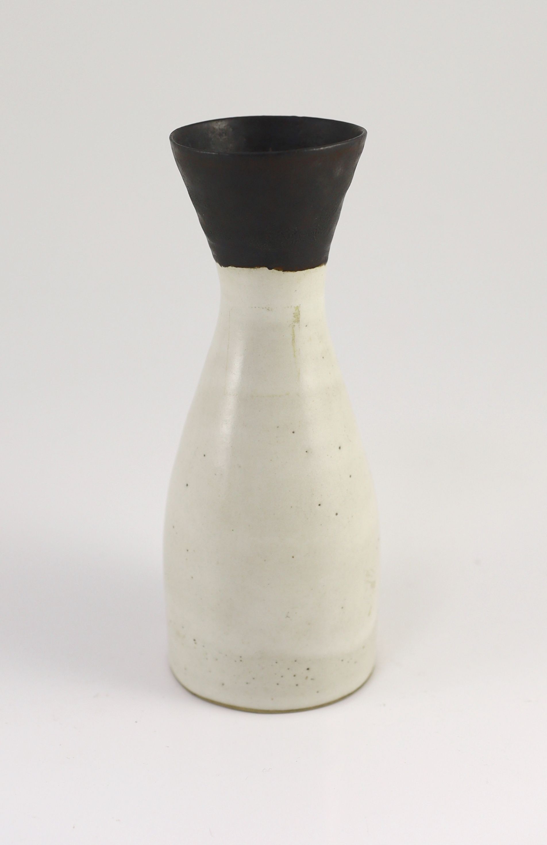 Dame Lucie Rie (1902-1995), a stoneware conical vase, 18.5cm high